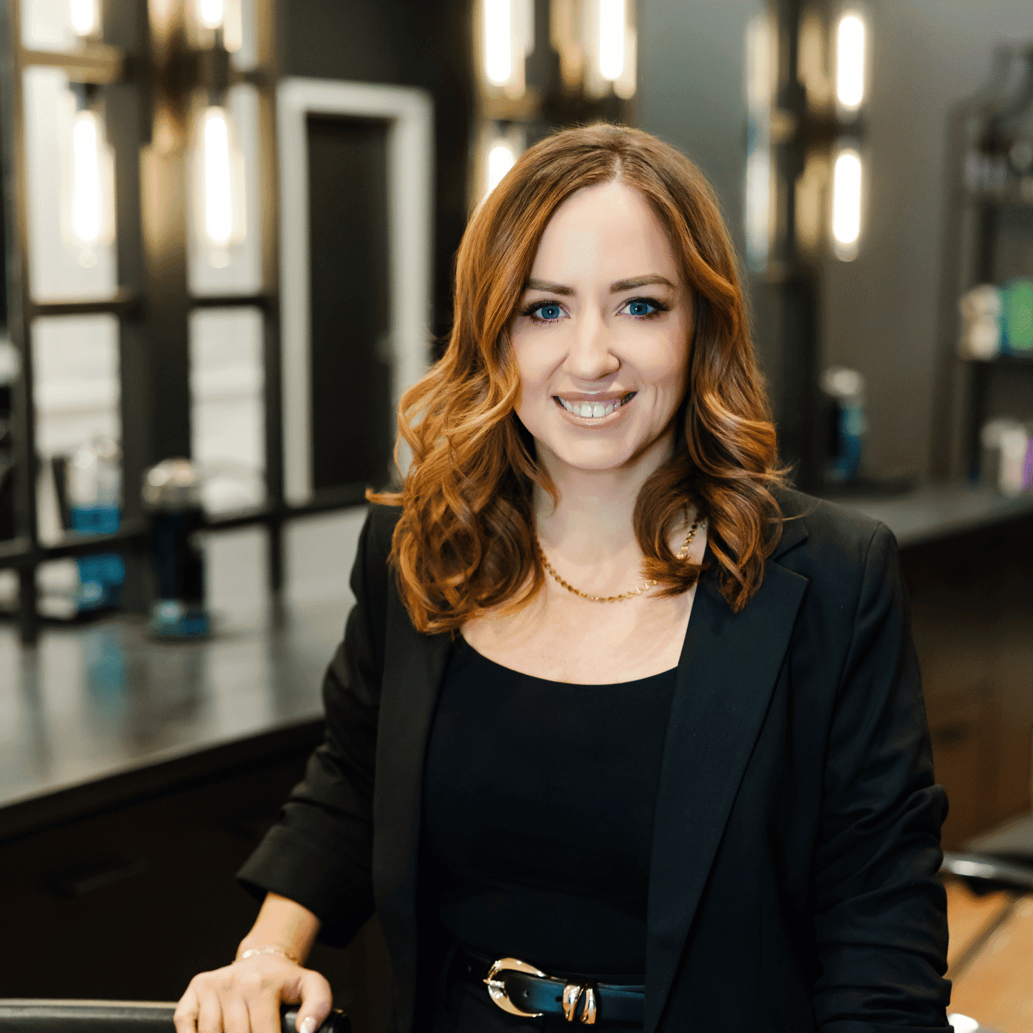 Portrait of Kara, a professional stylist at Avanté Salon & Spa, showcasing their expertise and style.