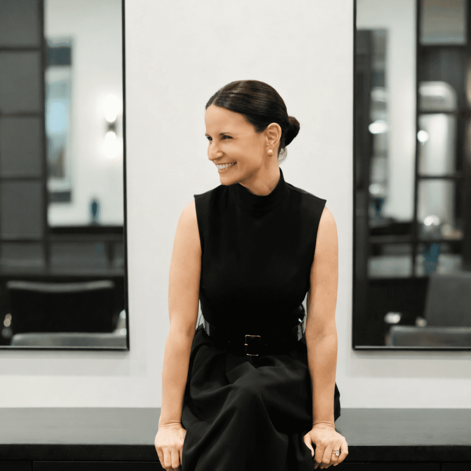 Portrait of Beverly, a professional stylist at Avanté Salon & Spa, showcasing their expertise and style.