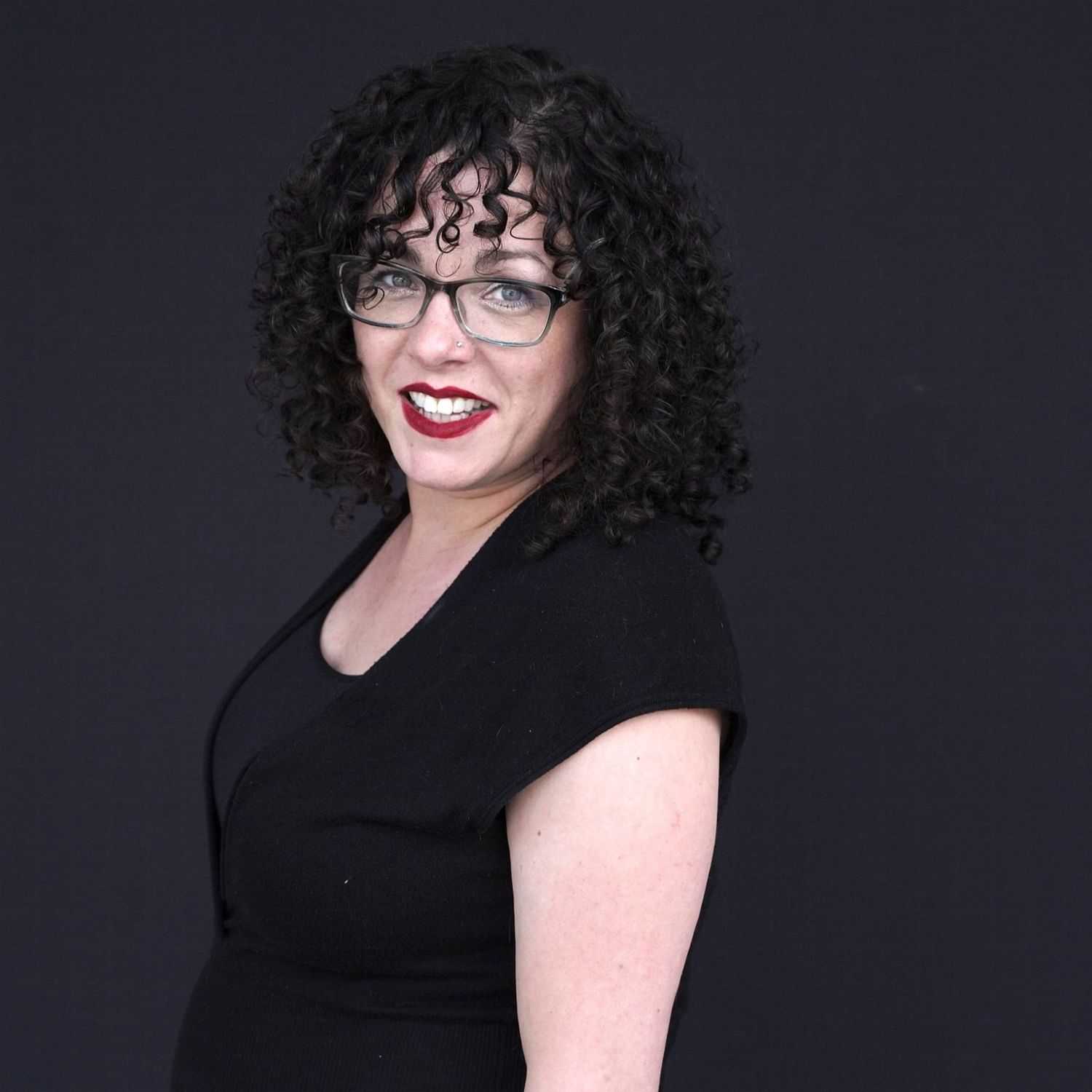 Portrait of Deidre, a professional stylist at Avanté Salon & Spa, showcasing their expertise and style.