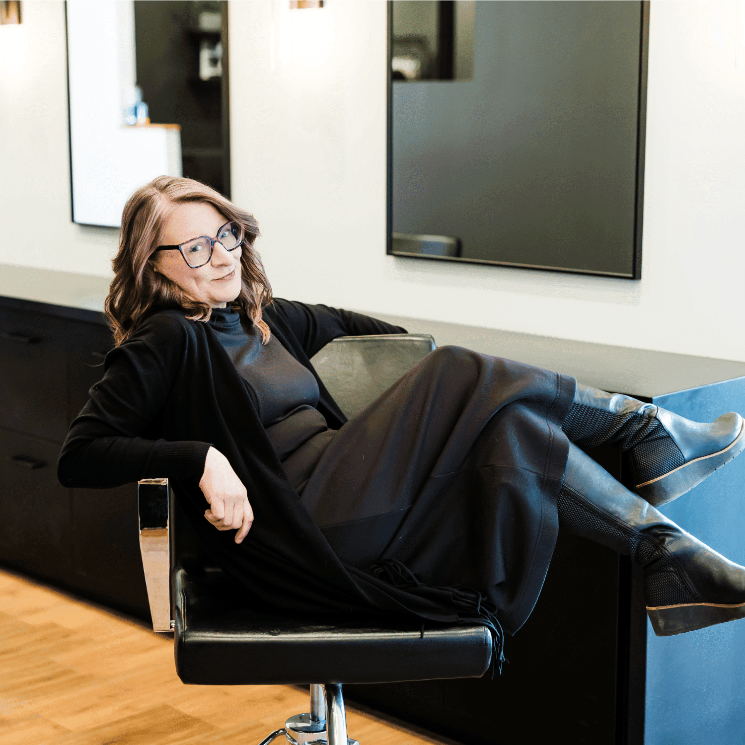 Portrait of Holly, a professional stylist at Avanté Salon & Spa, showcasing their expertise and style.