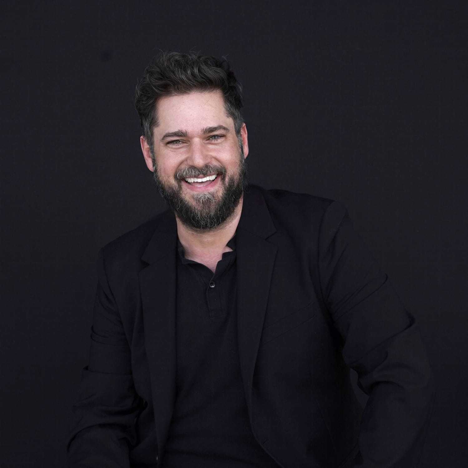 Portrait of Doug, a professional stylist at Avanté Salon & Spa, showcasing their expertise and style.