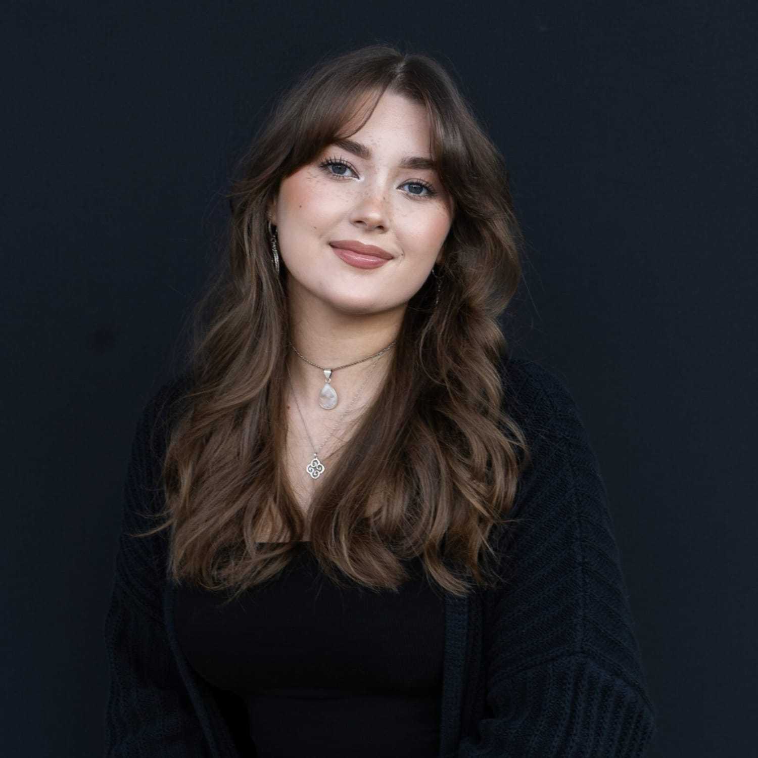 Portrait of Gabby, a professional stylist at Avanté Salon & Spa, showcasing their expertise and style.