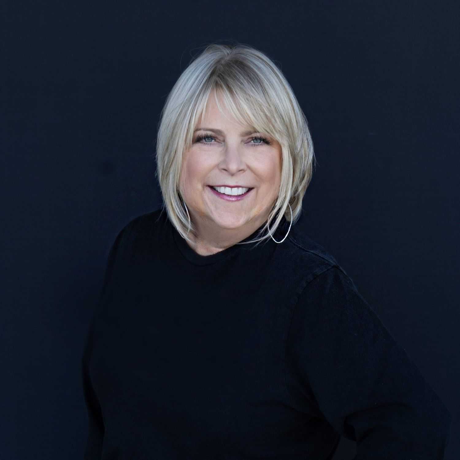 Portrait of Roseanne, a professional stylist at Avanté Salon & Spa, showcasing their expertise and style.