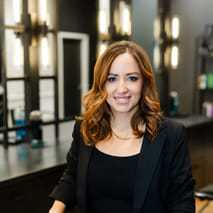 Portrait of Kara, a professional stylist at Avanté Salon & Spa, showcasing their expertise and style.
