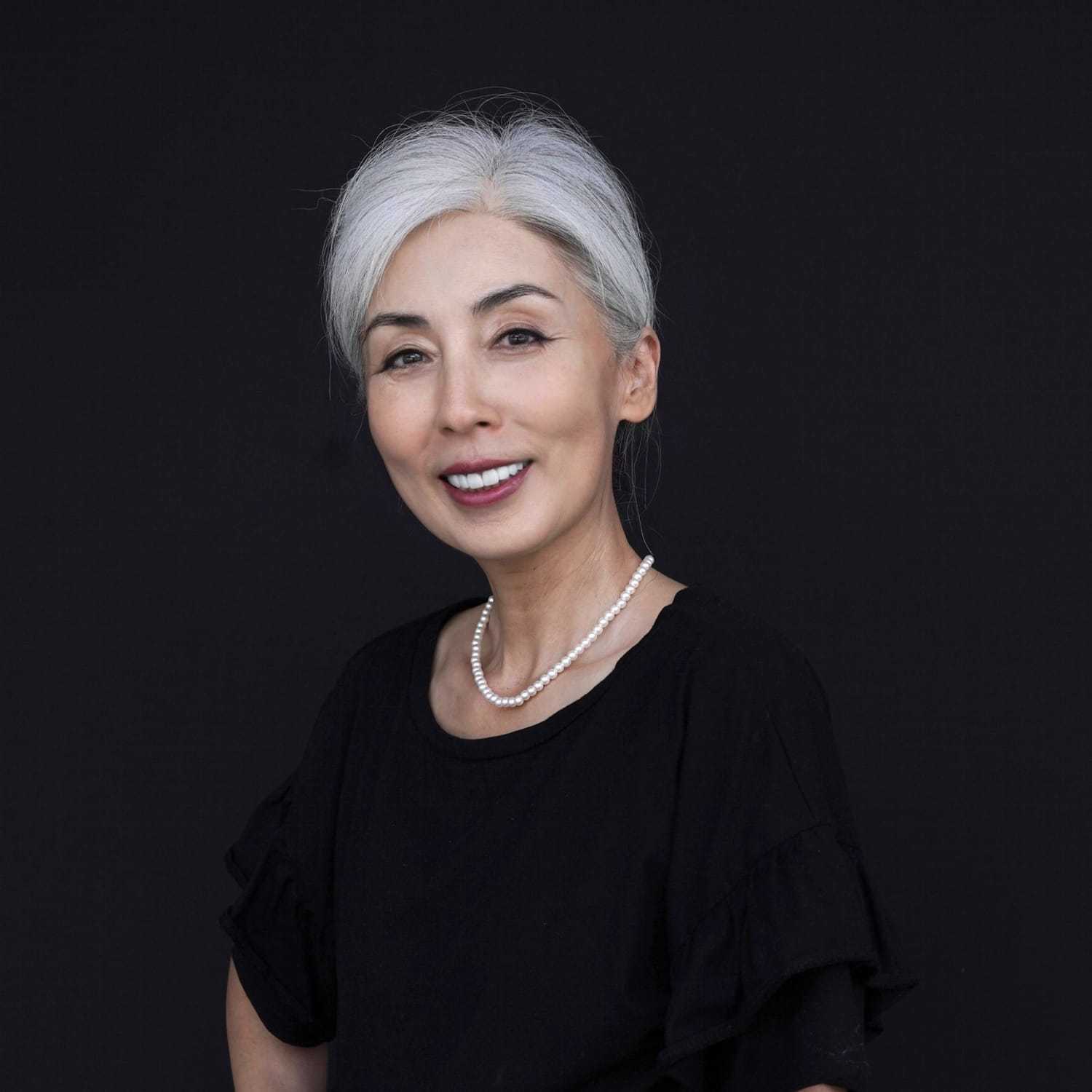 Portrait of Jenny, a professional stylist at Avanté Salon & Spa, showcasing their expertise and style.