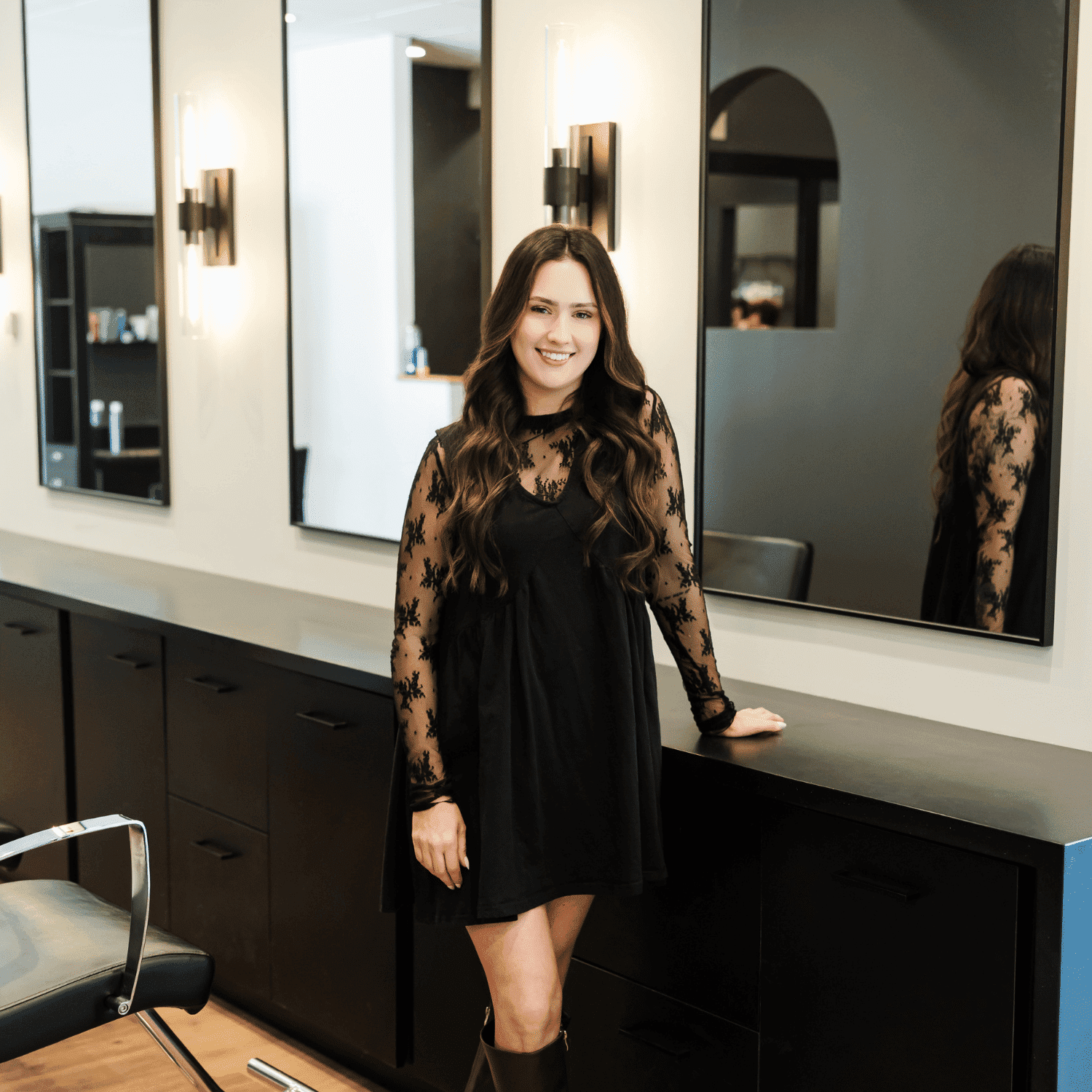 Portrait of Sam, a professional stylist at Avanté Salon & Spa, showcasing their expertise and style.
