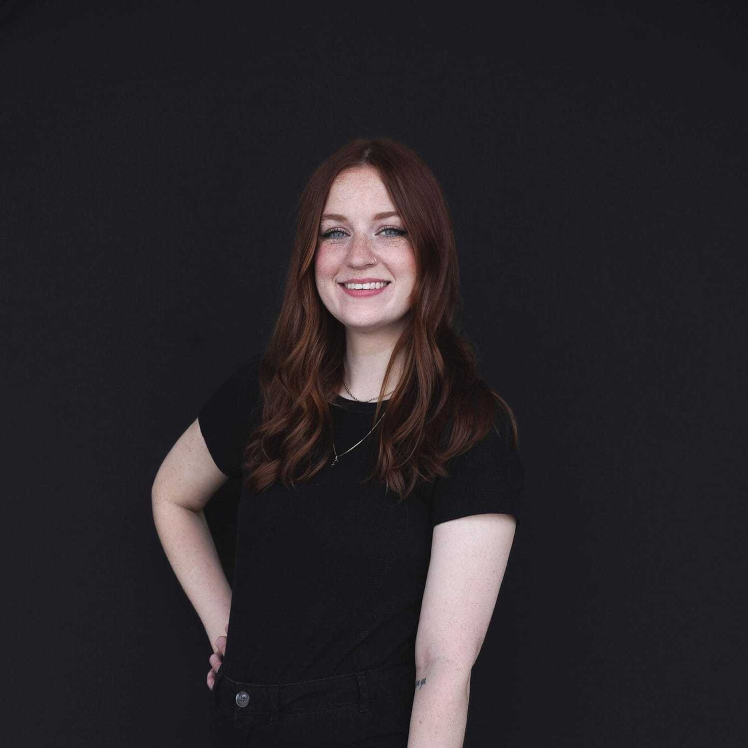 Portrait of Rebecca, a professional stylist at Avanté Salon & Spa, showcasing their expertise and style.