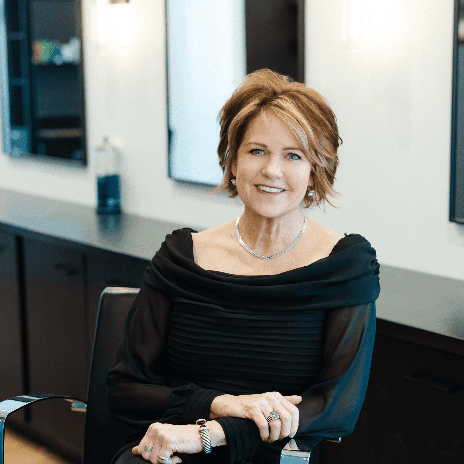 Portrait of Shel, a professional stylist at Avanté Salon & Spa, showcasing their expertise and style.