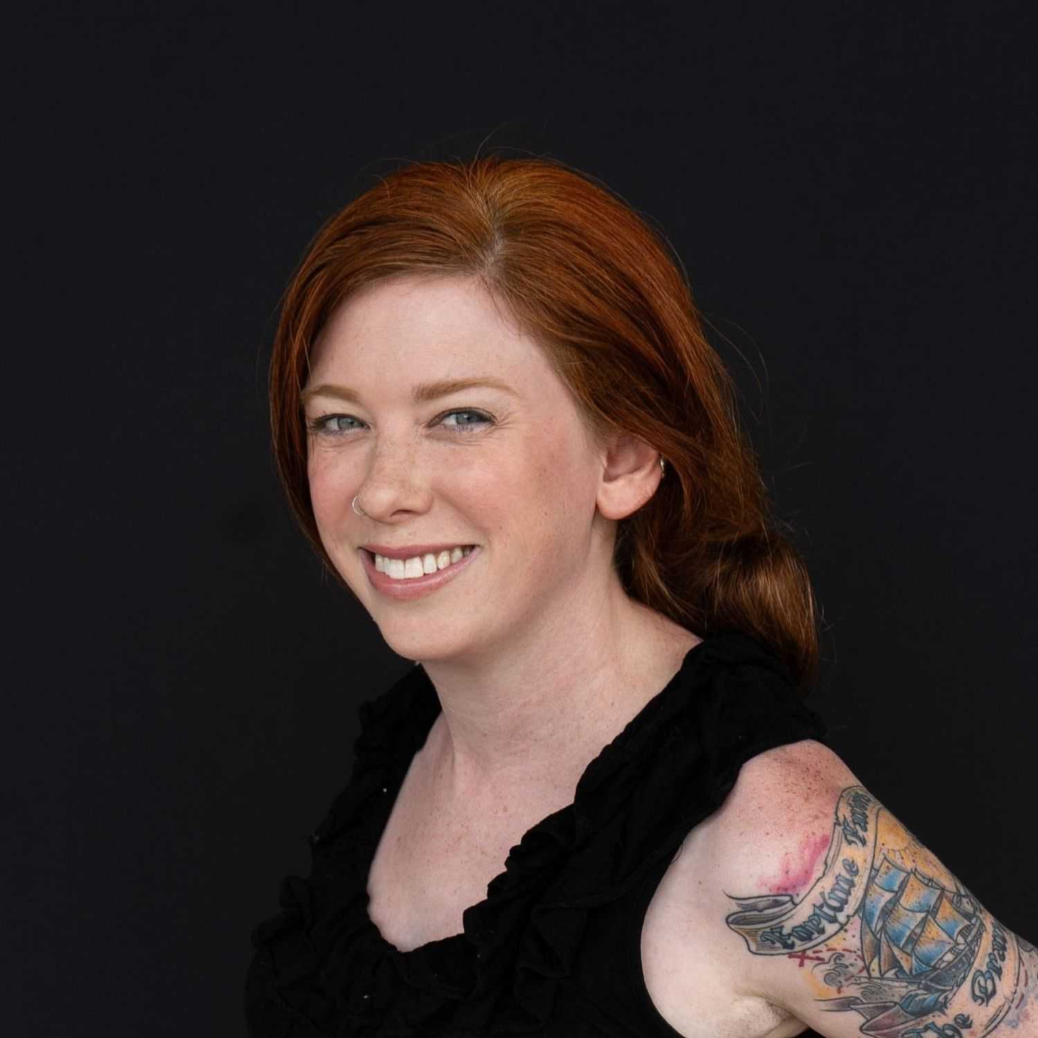 Portrait of Kat, a professional stylist at Avanté Salon & Spa, showcasing their expertise and style.