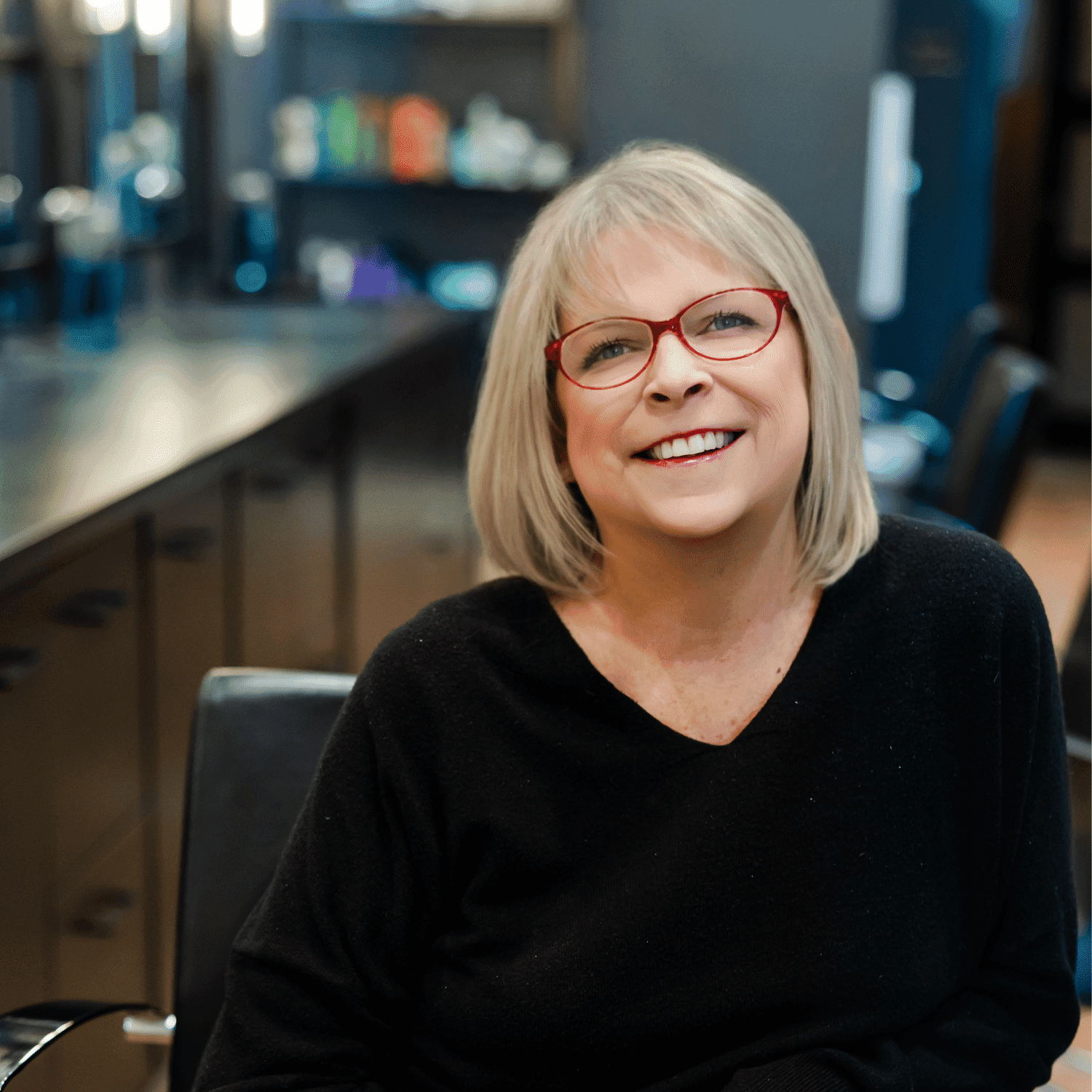 Portrait of Roseanne, a professional stylist at Avanté Salon & Spa, showcasing their expertise and style.