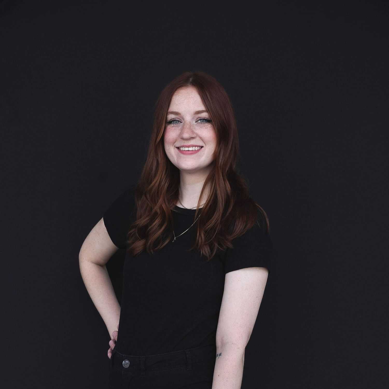 Portrait of Rebecca, a professional stylist at Avanté Salon & Spa, showcasing their expertise and style.