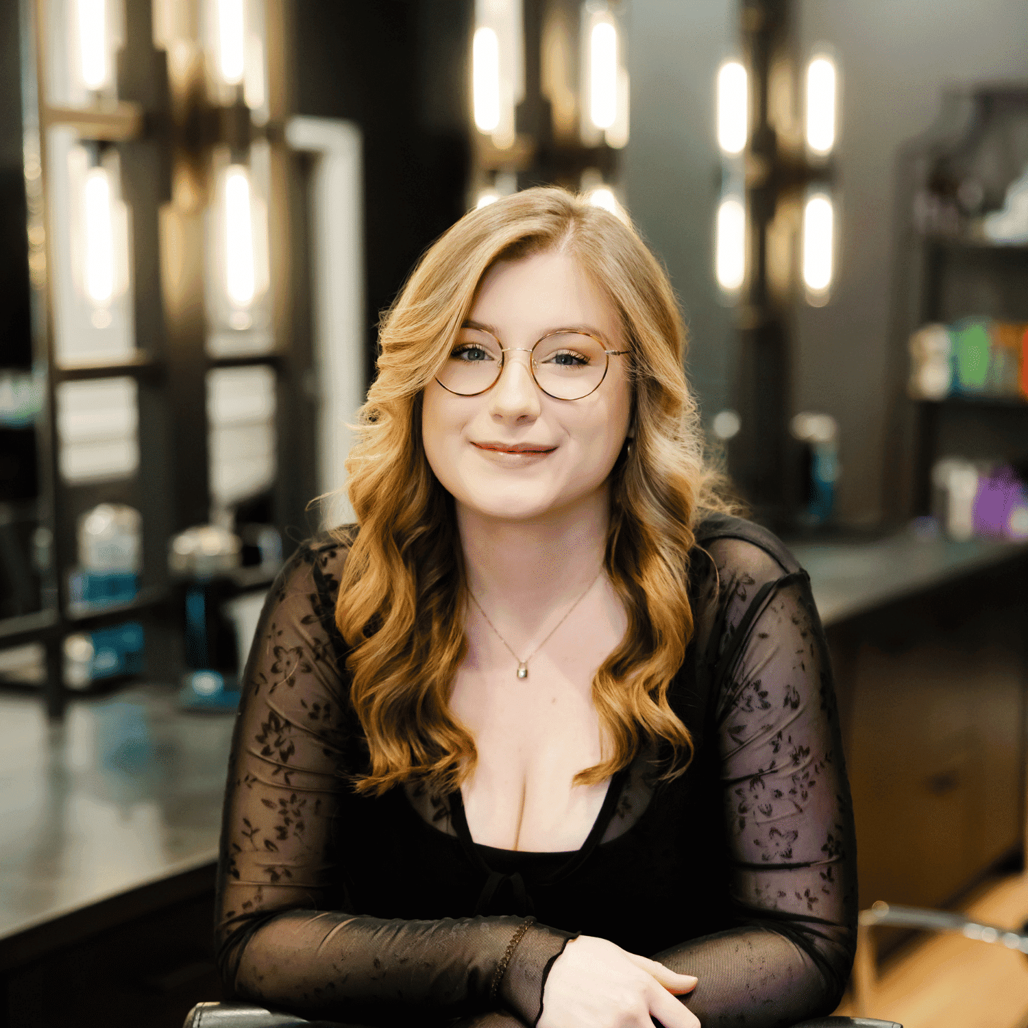 Portrait of Chloe, a professional stylist at Avanté Salon & Spa, showcasing their expertise and style.